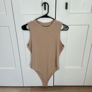 Beige mockneck bodysuit